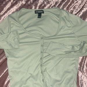 Large mint green buttoned long sleeve top, size Large, form fitting, like new
